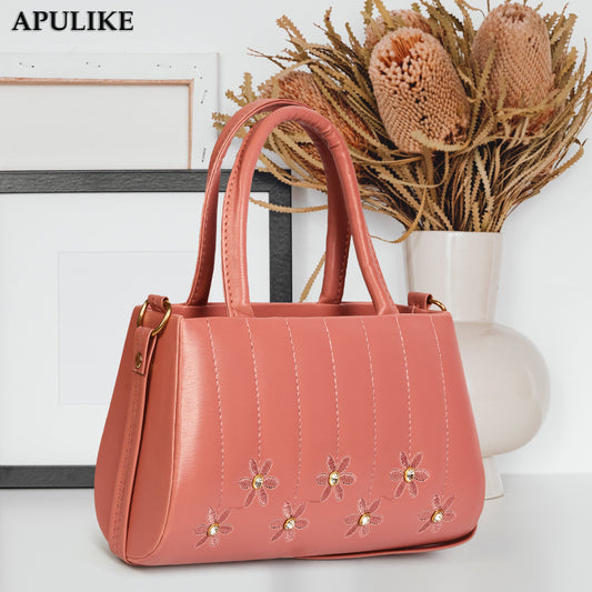 Pink Handbag with Floral Embroidery, Gemstone Accents, and Adjustable Strap for Women