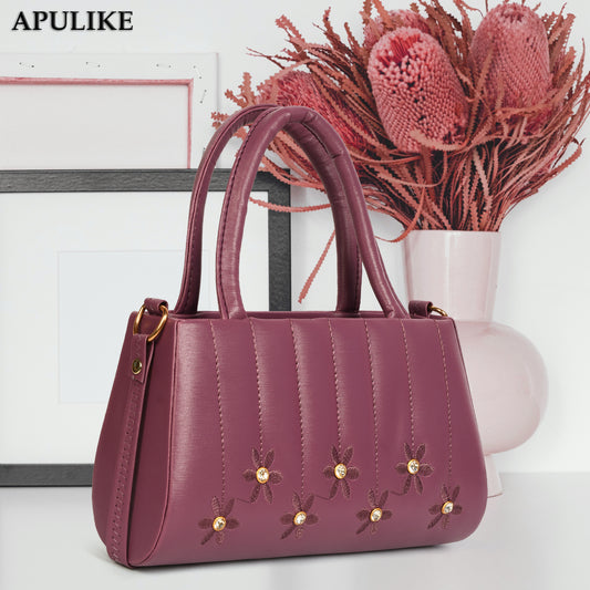 Plum Handbag with Elegant Floral Embroidery, Dual Handles, and Adjustable Shoulder Strap